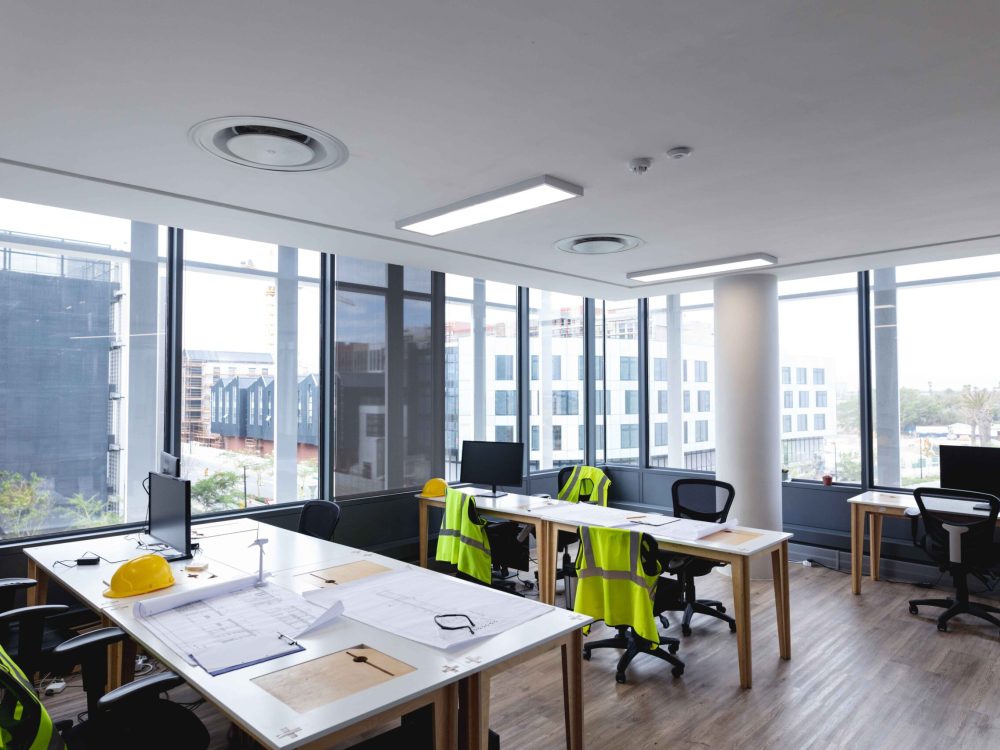 interior-of-empty-modern-office-with-desks-and-com-2025-04-05-01-40-24-utc_11zon